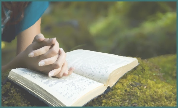 Woman discerning religious life while praying with Bible